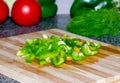 Juicy ripe sweet pepper sliced Ã¢â¬â¹Ã¢â¬â¹into pieces for salad, home cooking Royalty Free Stock Photo